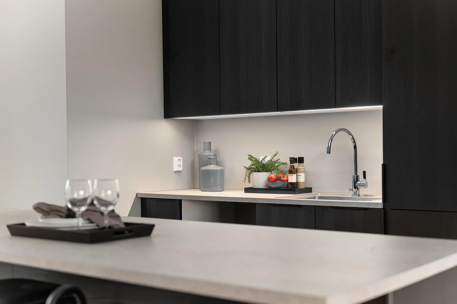 A black and white interior kitchen of a luxury Southern Californian house