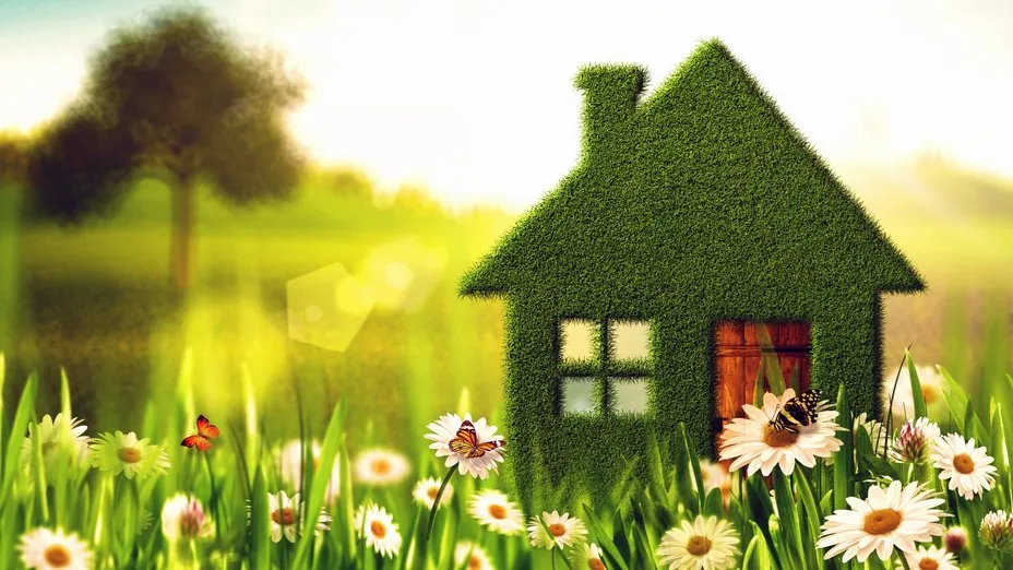 Illustration of a green eco-friendly house in a flower meadow, representing sustainable living in Southern California real estate.